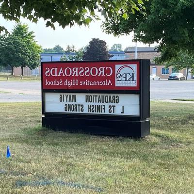 Sign outside Crossroads Alternative High School at 28 60th Street SE